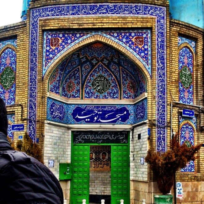 a mosque close to the grand bazaar of tehran which is decorated with beautiful blue mosaics